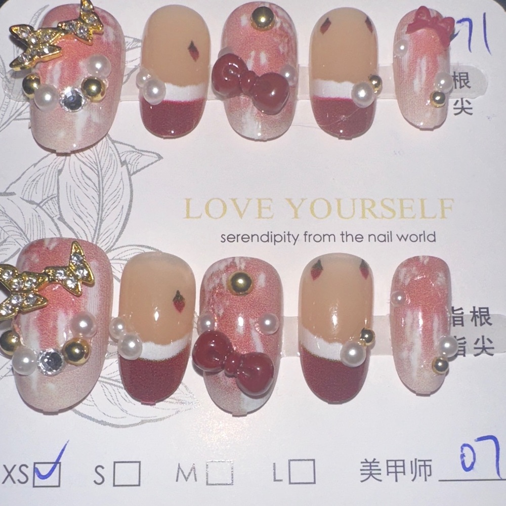 Elegant Nail Art Set with Red and Gold Accents
